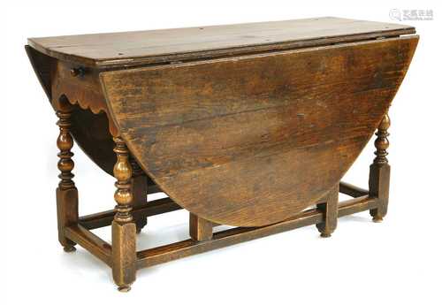 An oak gateleg table,