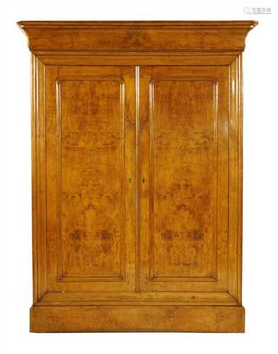 A large Continental burr ash armoire,