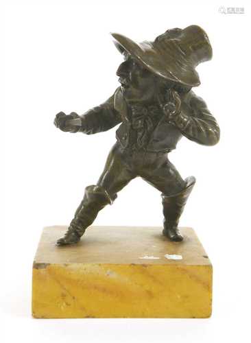 A bronze figure of a hunchback swordsman,