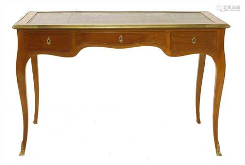 A French Louis XV-style mahogany and gilt metal-mounted writing table,