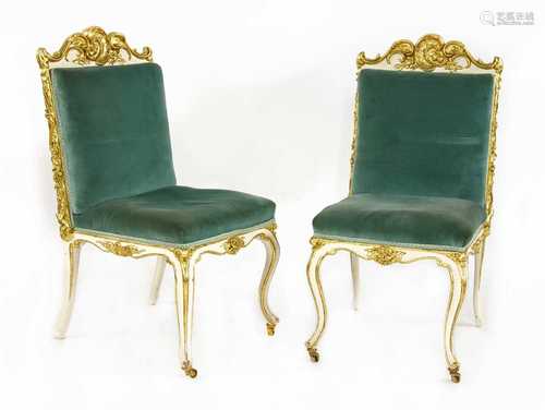 A pair of parcel gilt Chippendale-style side chairs,