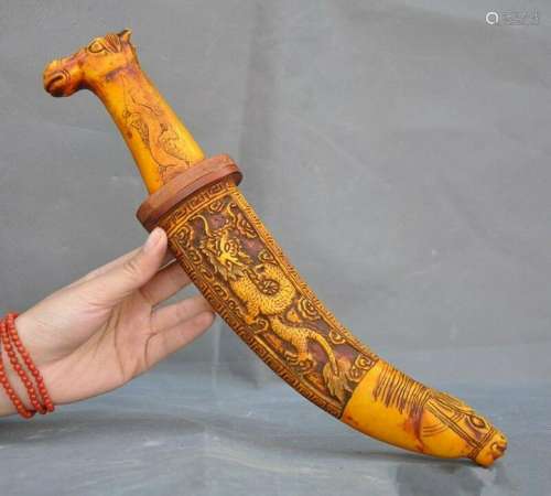 A OLD CATTLE BONE CARVED SWORD QING DYNASTY.