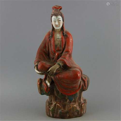 A PORCELAIN BUDDHA FIGURE MING DYNASTY 14TH/C.