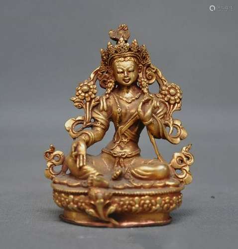 A BRONZE GILT 24KT-GOLD BUDDHA FIGURE QING DYNASTY.