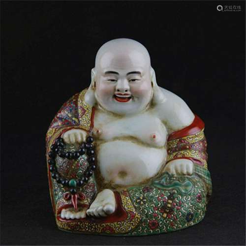 A PORCELAIN ENAMEL BUDDHA FIGURE QING DYNASTY 17TH/C.