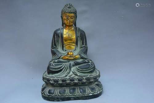 A GILT BRONZE SHAKYAMUNI BUDDHA FIGURE MING DYNASTY.