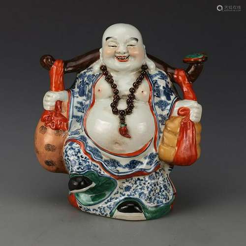 A PORCELAIN ENAMEL BUDDHA FIGURE QING DYNASTY 17TH/C.