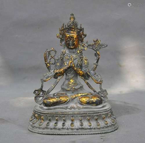 A GILT BRONZE GUAN-YIN BUDDHA FIGURE MING DYNASTY.