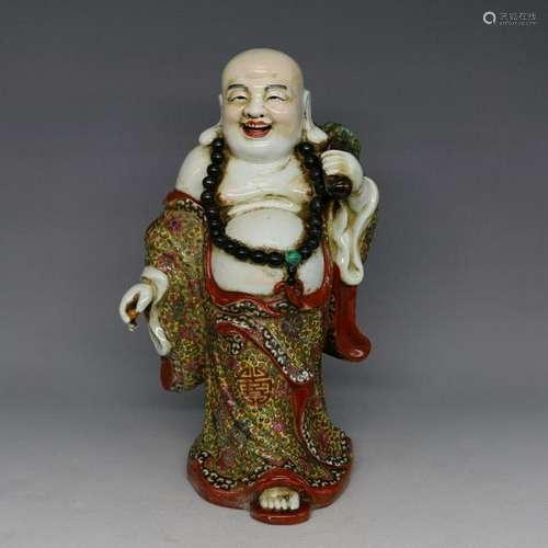 A PORCELAIN ENAMEL BUDDHA FIGURE QING DYNASTY 17TH/C.