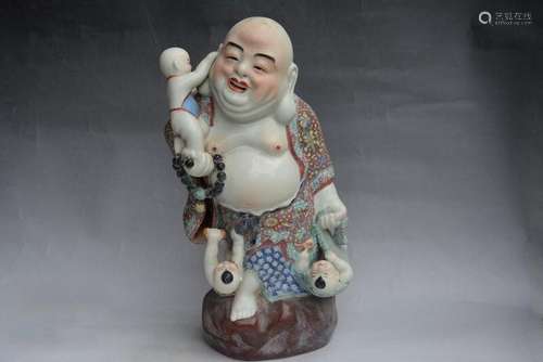 A PORCELAIN ENAMEL BUDDHA FIGURE QING DYNASTY 17TH/C.