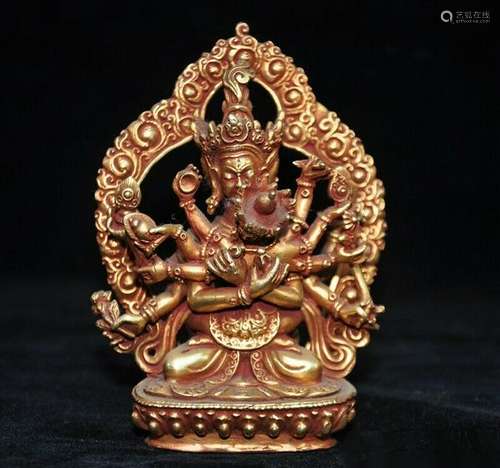 A BRONZE GILT 24KT-GOLD BUDDHA FIGURE QING DYNASTY.