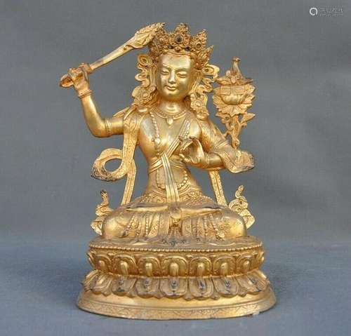 A GILT BRONZE KWAN-YIN BUDDHA FIGURE QING DYNASTY.