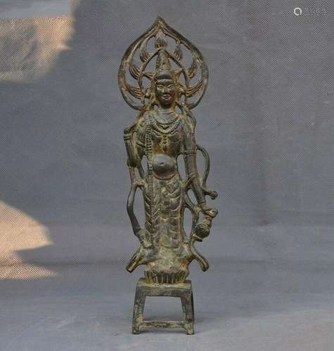 A BRONZE GUAN-YIN BUDDHA FIGURE MING DYNASTY.