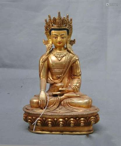 A BRONZE GILT 24KT-GOLD BUDDHA FIGURE QING DYNASTY.