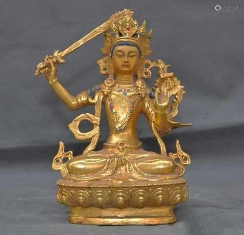 A GILT BRONZE KWAN-YIN BUDDHA FIGURE QING DYNASTY.