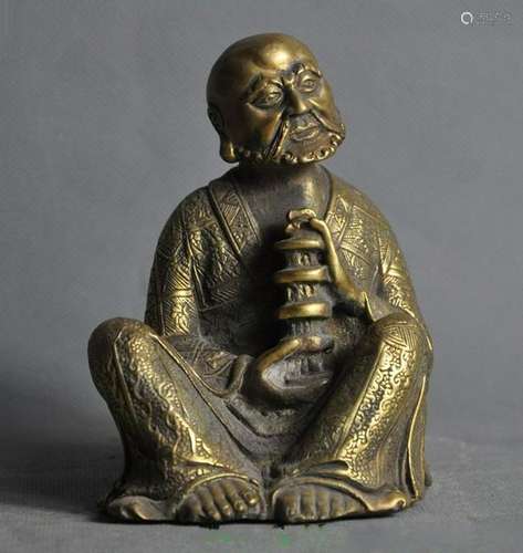 A BRONZE DHARMA BUDDHA FIGURE QING DYNASTY.