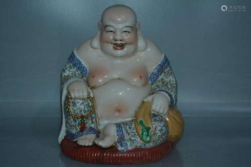 A PORCELAIN ENAMEL BUDDHA FIGURE QING DYNASTY 17TH/C.