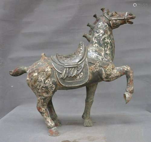 A BRONZE WARE SILVER HORSE STATUE MING DYNASTY.