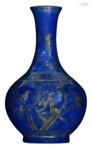 A Chinese blue ground and gilt decorated bottle vase,