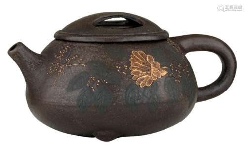 A Chinese zhisha earthenware teapot, decorated with