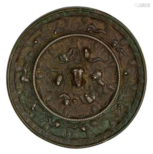 A Chinese silver plated bronze circular mirror,
