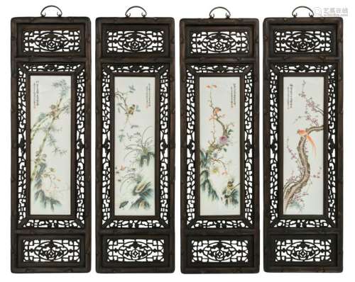 Four Chinese polychrome plaques, decorated with birds