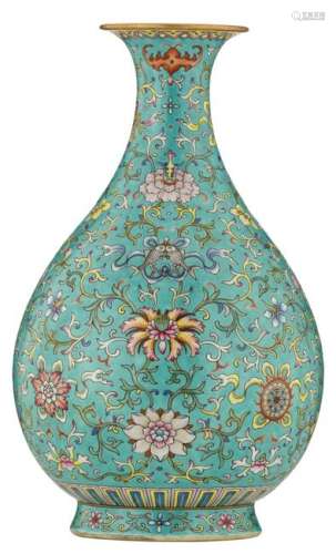 A Chinese turquoise ground pear shaped vase, famille