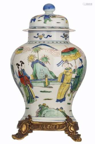 A Chinese wucai vase and cover, decorated with a
