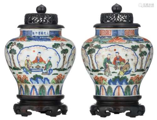 Two Chinese wucai floral decorated vases and hardwood