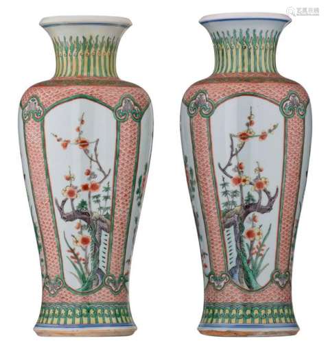 A pair of Chinese famille verte vases, the roundels