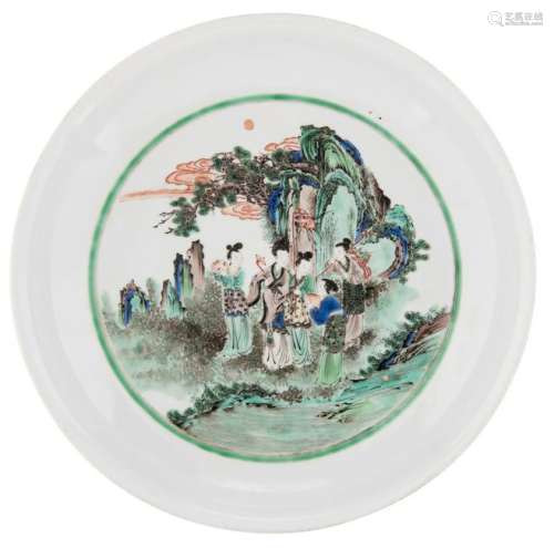 A Chinese famille verte plate, the well decorated with