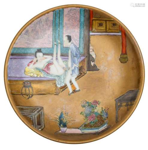 A Chinese polychrome and gilt decorated dish, the well