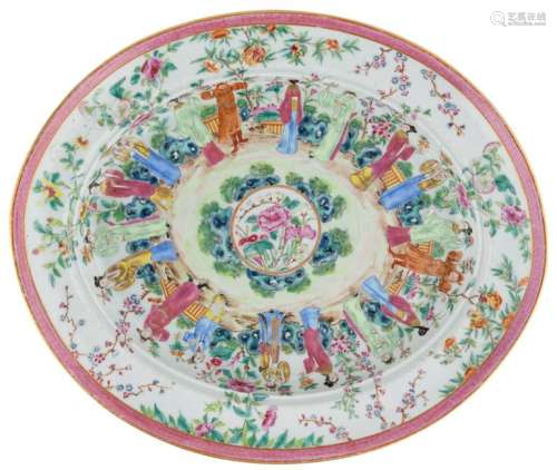 A Chinese famille rose oval shaped plate, decorated