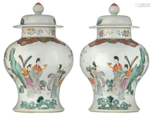 A pair of Chinese famille rose covered jars, decorated