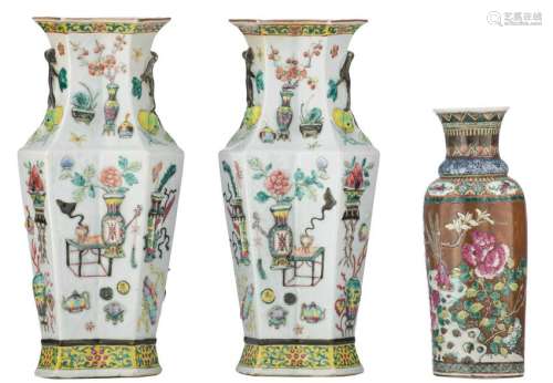 A pair of Chinese famille rose hexagonal vases, relief
