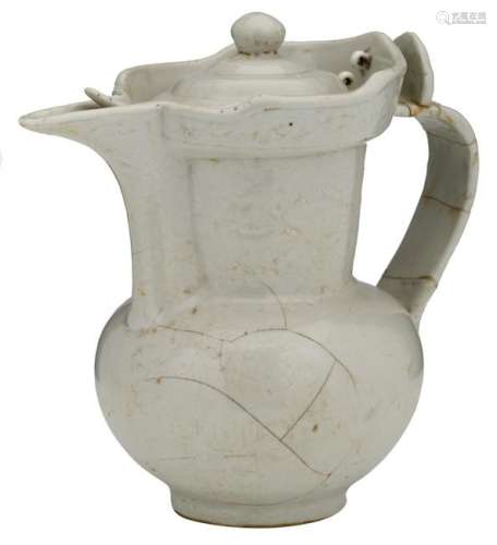 A Chinese glazed Yue jug and cover with incised