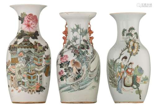 Three Chinese famille rose vases, decorated with the