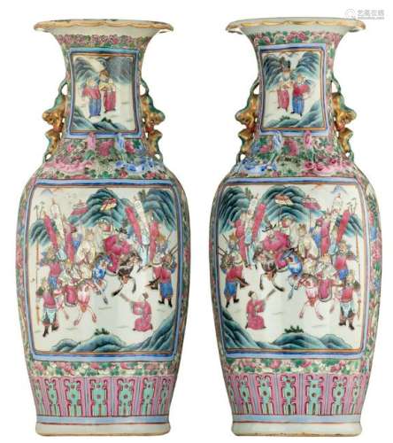 A pair of Chinese famille rose vases, the roundels