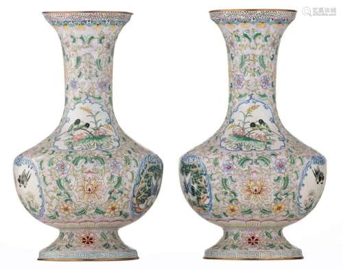 A pair of Chinese floral decorated Canton enamel vases,