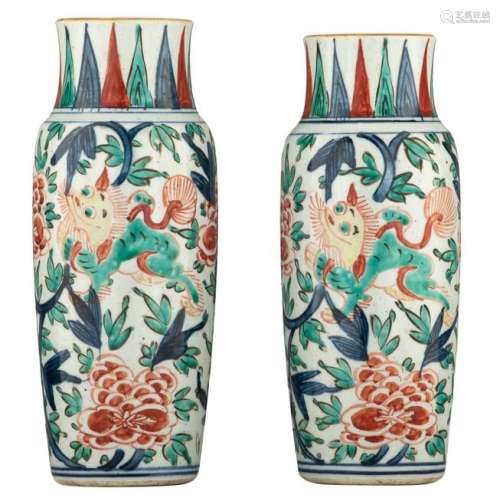 A pair of Chinese polychrome Ming type cylinder shaped