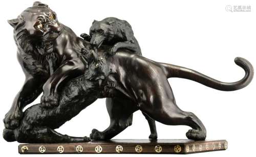 Lion fighting the wolves, Japanese patinated bronze on