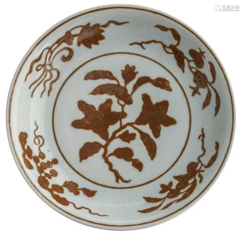 A Chinese copper red plate, decorated with lotus