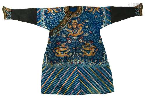 A blue ground richly embroidered jifu, decorated with