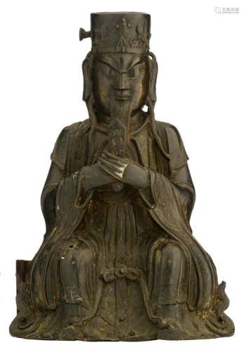 A Chinese Ming style bronze figure of a seated