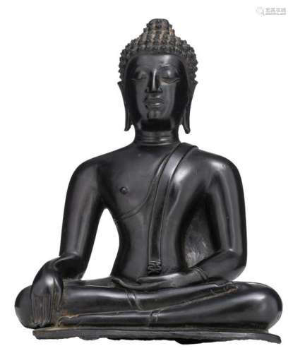 A South East Asian bronze seated figure, depicting a