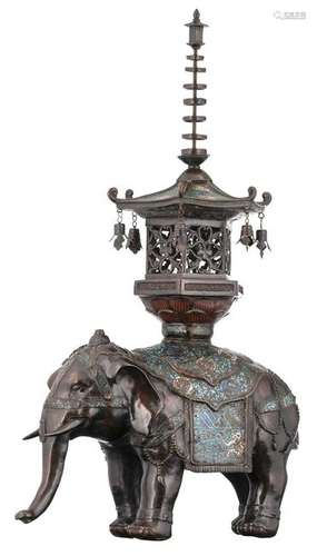 An Oriental champleve enamel bronze elephant, carrying