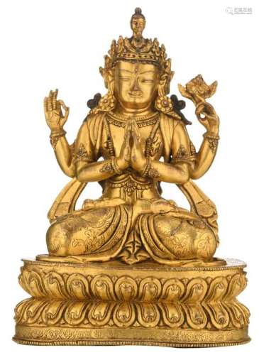 A Sino-Tibetan gilt bronze four armed Buddha on a lotus