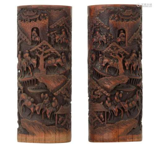 A pair of Chinese richly carved bamboo brushpots,
