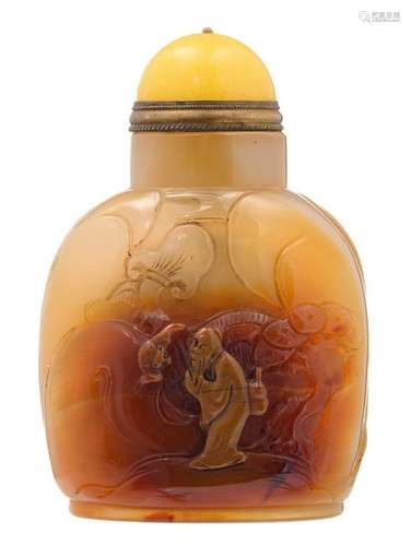 A russet jade snuff bottle, decorated with the Immortal