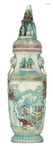 A Chinese polychrome decorated ivory covered vase,